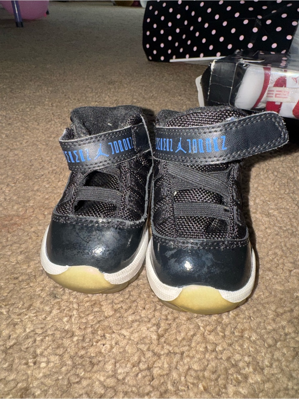 Jordan 11’s Toddler Black Sneakers with Blue Logo Accents (space jams)